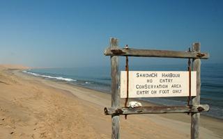 Sandwich Harbour at the Namibian coast - Where dunes and ocean meet